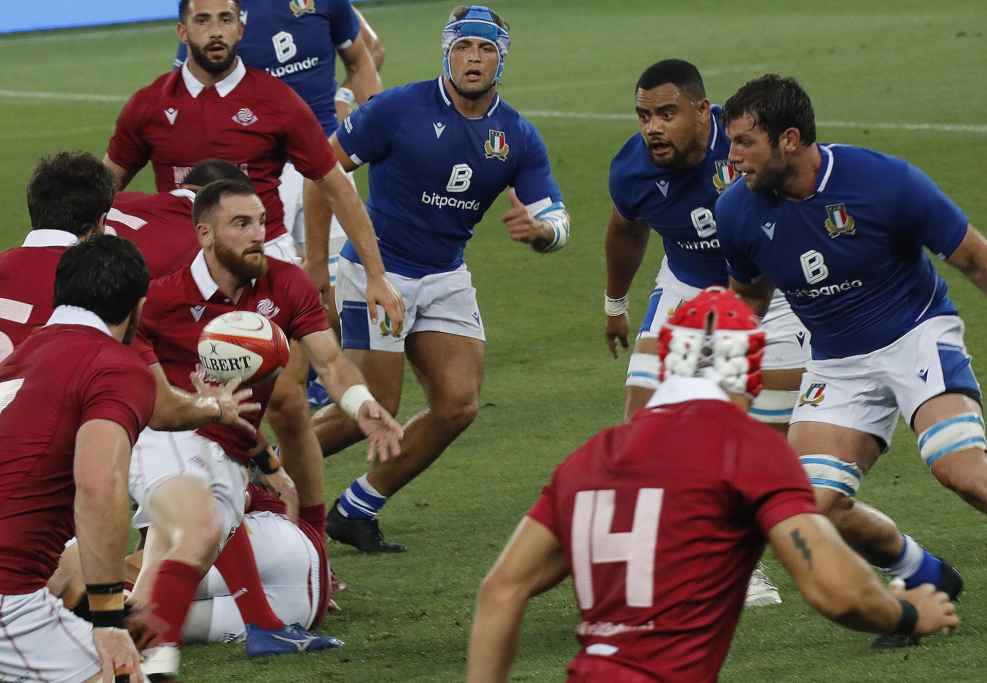 Georgia and Italy rugby players contesting the ball