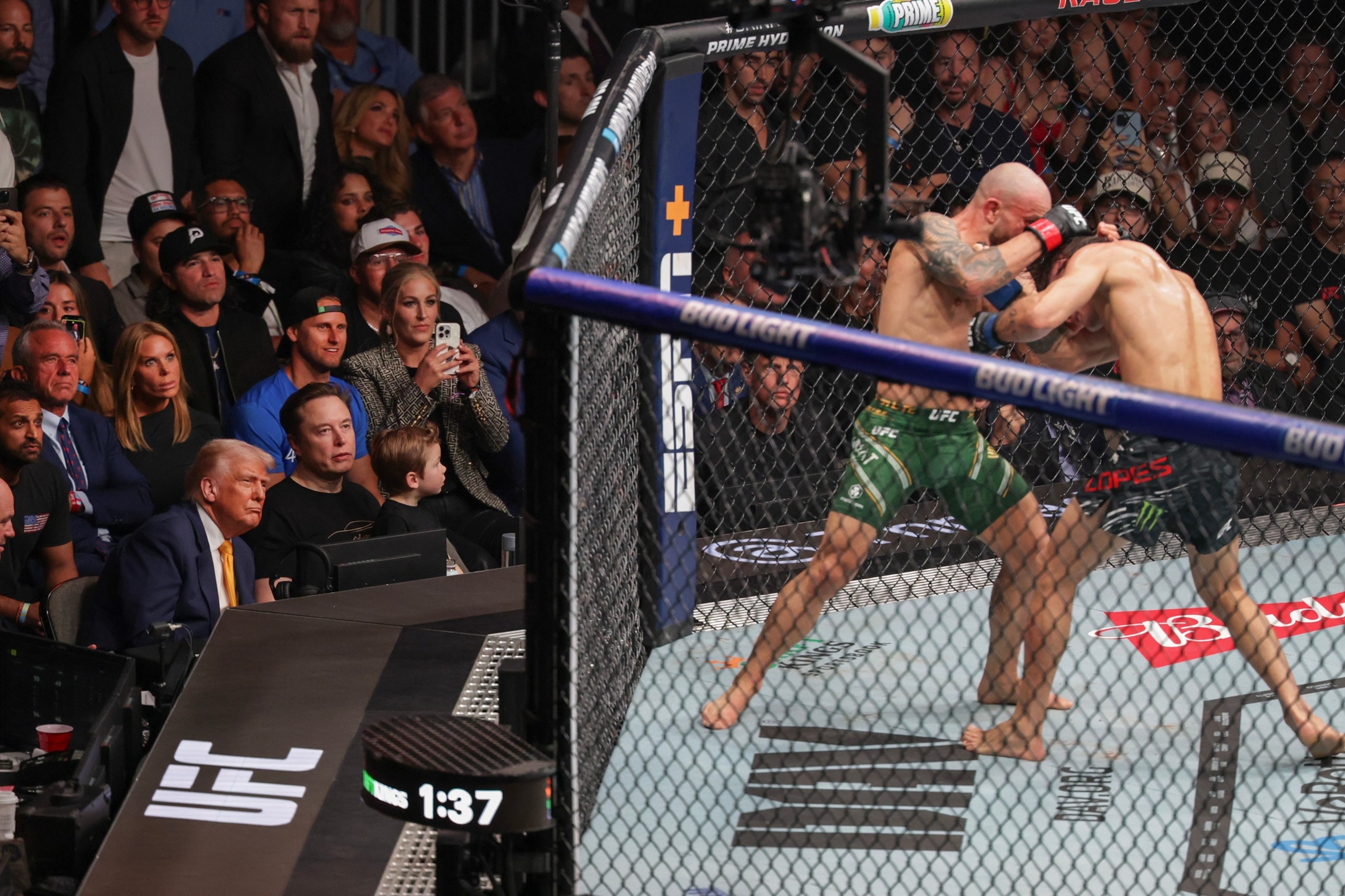President Donald Trump watches Alexander Volkanovski and Diego Lopes fight at UFC 314 in Miami